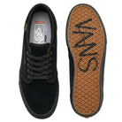 An Atiba Vans Skate Chukka Black Black VN0A7SLZBKA1 Suede Skateboarding Shoe shown from above, with its tan, diamond-patterned rubber outsole displayed next to it.