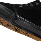 Close-up of Atiba Vans Skate Chukka Black Black VN0A7SLZBKA1 Suede Skateboarding Shoes featuring a black suede upper and a textured gum rubber outsole.
