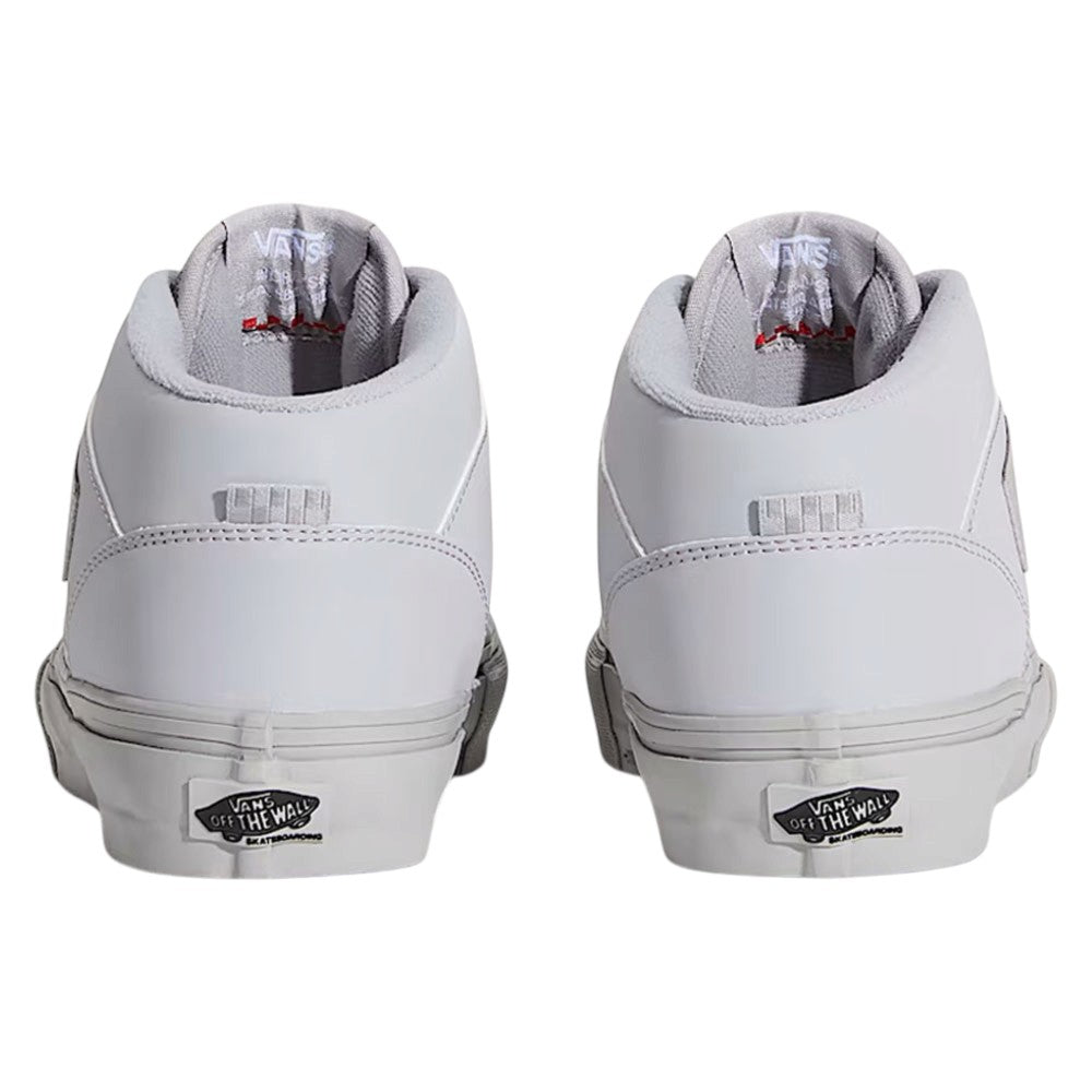 Back view of two light gray Atiba Vans Skate Half Cab Light Gray VN0A5FCDBH71 Suede Skateboarding Shoes featuring a branded heel patch and a padded collar.