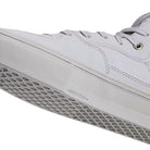 Close-up of a light gray Atiba Vans Skate Half Cab Light Gray VN0A5FCDBH71 Suede Skateboarding Shoe with a textured rubber toe bumper and Duracap branding on the side of the sole.