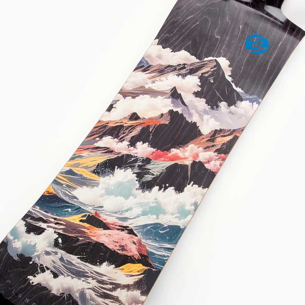 A close-up of the Atmosphere Switchblade 40 Landyachtz Complete Skateboard, showcasing its colorful artistic design with mountains, clouds, and waves against a white background.
