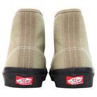 A pair of Authentic High Elm Black VN000CBQEL7 Vans Skate Canvas Rubber Shoes viewed from the back, showcasing white stitching and red Vans Off The Wall skateboarding logos above black soles. These durable shoes feature classic skate design details, making them ideal for everyday wear.