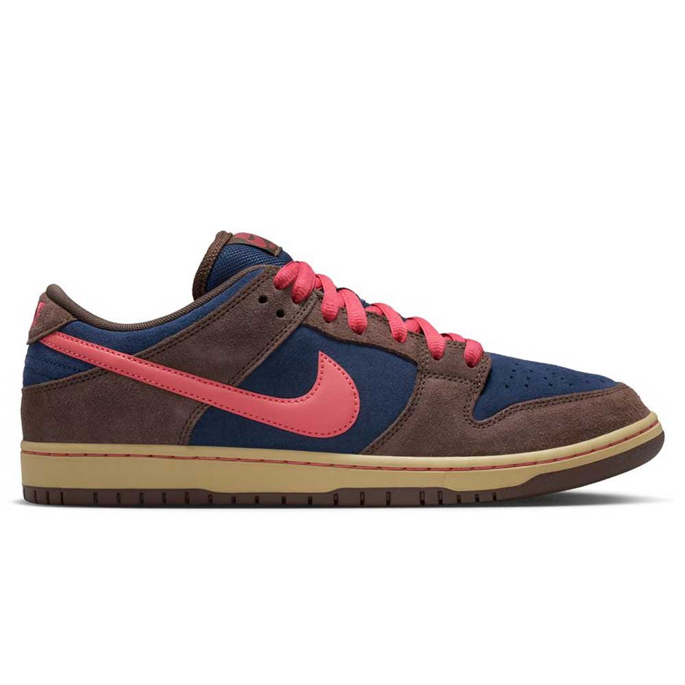 The Baroque Brown Adobe Midnight Navy Dunk Low Pro HQ1625200 Nike SB suede shoes feature dark blue panels, brown suede overlays, a light brown sole, bright pink Swoosh, pink laces, and matching pink accents on the tongue and heel.