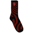 The Big Head Fill EMB Swirl Dark Red Sock from Spitfire Wheels features a swirling black and red pattern with the iconic Spitfire Wheels Big Head logo—a red cartoon face with a mischievous grin—embroidered near the top.