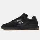 The Black 933 NAP New Balance Numeric Suede Skateboarding Shoes feature a suede and mesh upper, black laces, a white-outlined N logo, and a gum rubber sole—shown in side profile on a plain white background.