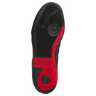 The image displays the black sole of the Black Black KK2981 Tyshawn II Suede Adidas Skateboarding Shoes, featuring textured patterns and red accents by the heel and side. The adidas Originals logo is visible within a circular area near the center, emphasizing the iconic design tailored for skateboarding enthusiasts.