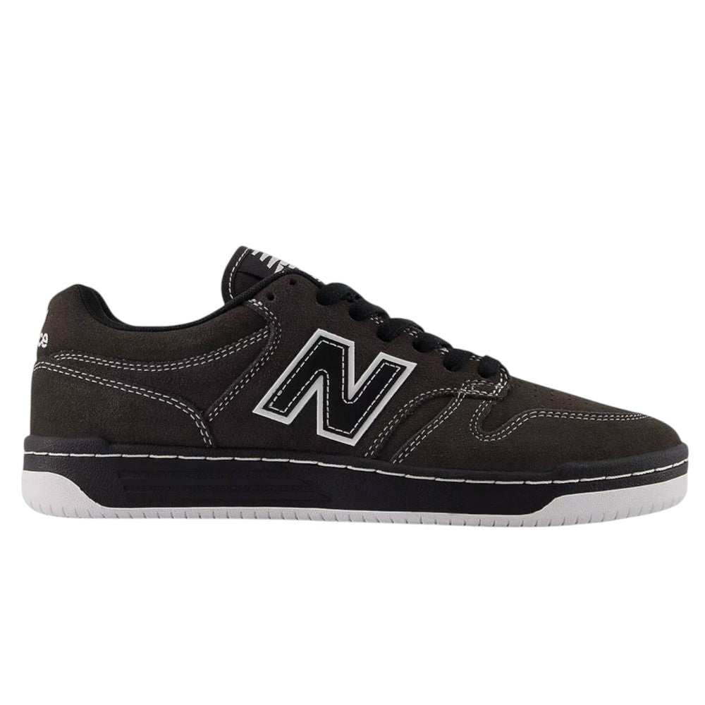 A Black Cement Cement 480 CSS New Balance Numeric suede skateboarding shoe with white accents, white stitching, and a white rubber sole—featuring FuelCell foam for enhanced cushioning—is shown in a side profile on a plain white background.