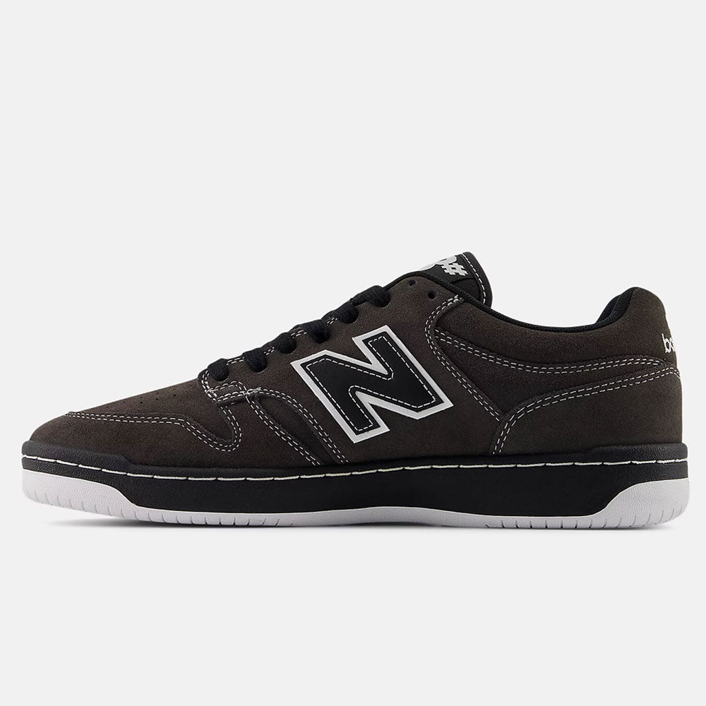 The Black Cement Cement 480 CSS New Balance Numeric Suede Skateboarding Shoes feature black suede, white accents, a bold N logo, black laces, and a white sole inspired by heritage basketball shoes, displayed on a plain white background.