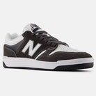 The Black Cement White 480 BAB New Balance Numeric Suede Skateboarding Shoe features a lightweight black and white suede finish, white N logo, white sole, black outsole, and is shown on a plain white background.