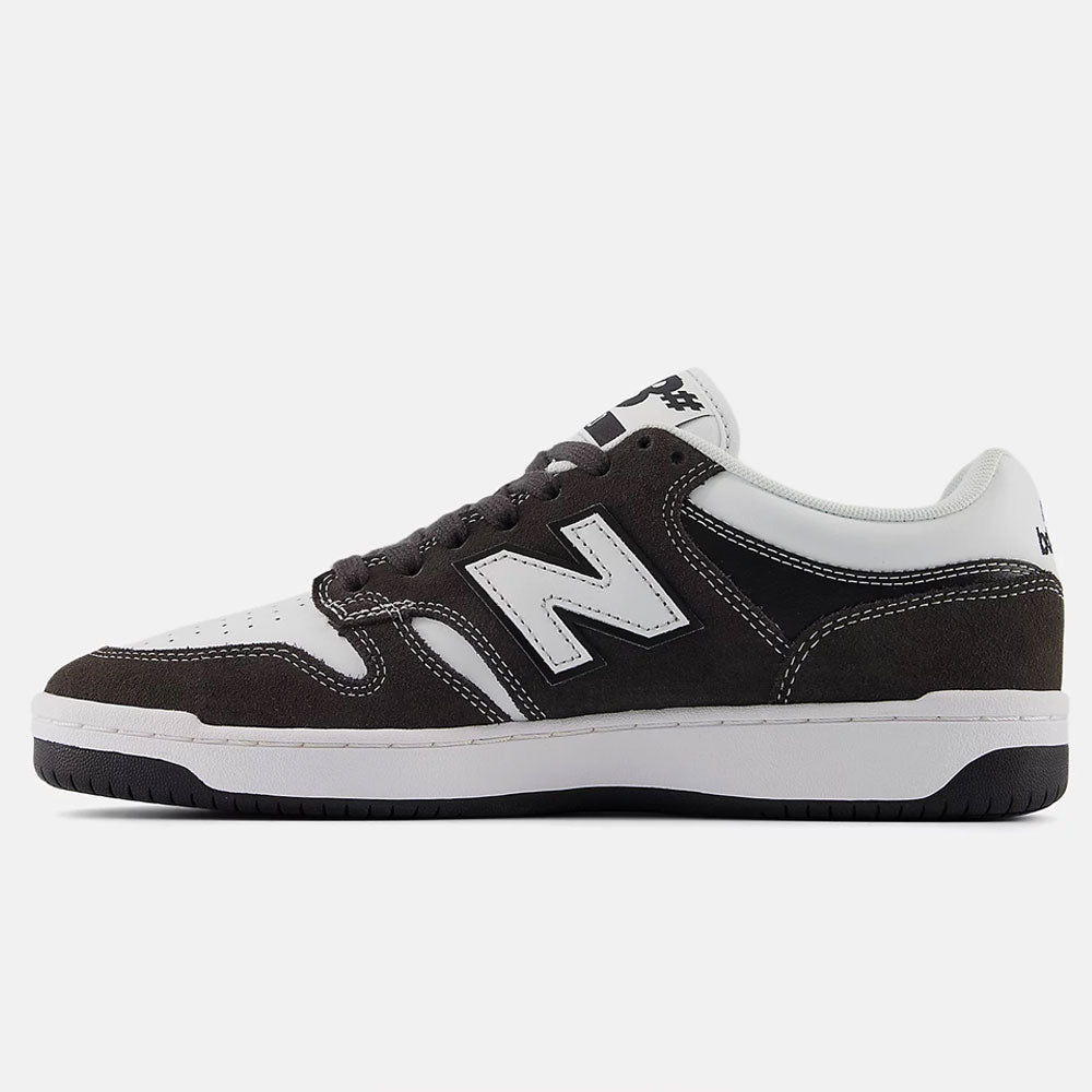 The Black Cement White 480 BAB New Balance Numeric Suede Skateboarding Shoes feature a lightweight suede upper, white N logo, and a white midsole with black outsole, shown on a plain white background.
