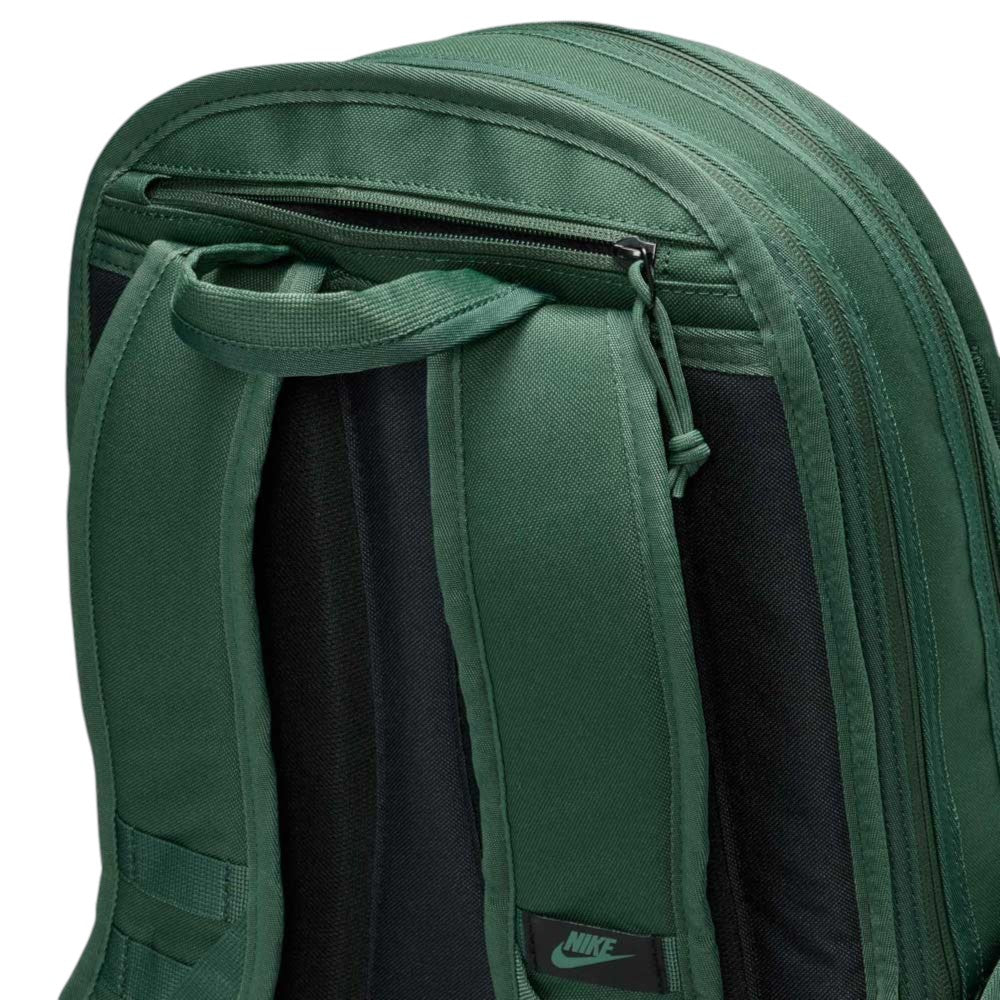 Close-up of the Black Fir FD7544323 Nike SB RPM Skate Backpack featuring padded straps, a top handle, and a zippered compartment. The iconic Nike logo appears on a small black patch. This water-resistant skate backpack blends durability with functional style for everyday use.