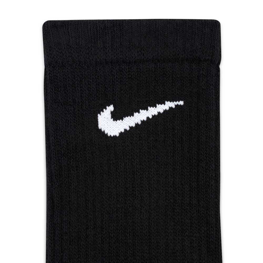 A close-up of a black Nike SB Socks Crew from the 3 Pack SX6888010, showcasing a cushioned design and white swoosh logo near the top.
