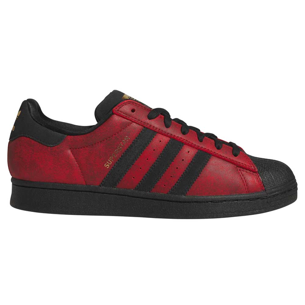 A side view of the Black Red Fog KJ5118 Superstar Adidas Skateboarding Suede Shoes Footwear showcases its bold red and black design with three black stripes, black laces, and a textured black sole against a white background—delivering a classic silhouette reimagined for skateboarding enthusiasts.