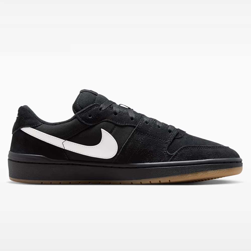 The Black Summit White Code 58 IB0108001 Nike SB Skateboarding Suede Shoes feature a low-top, basketball-inspired silhouette in black suede with a contrasting white Nike Swoosh, black laces, mesh detailing, and a brown rubber cupsole. The shoes are presented against a plain white background.