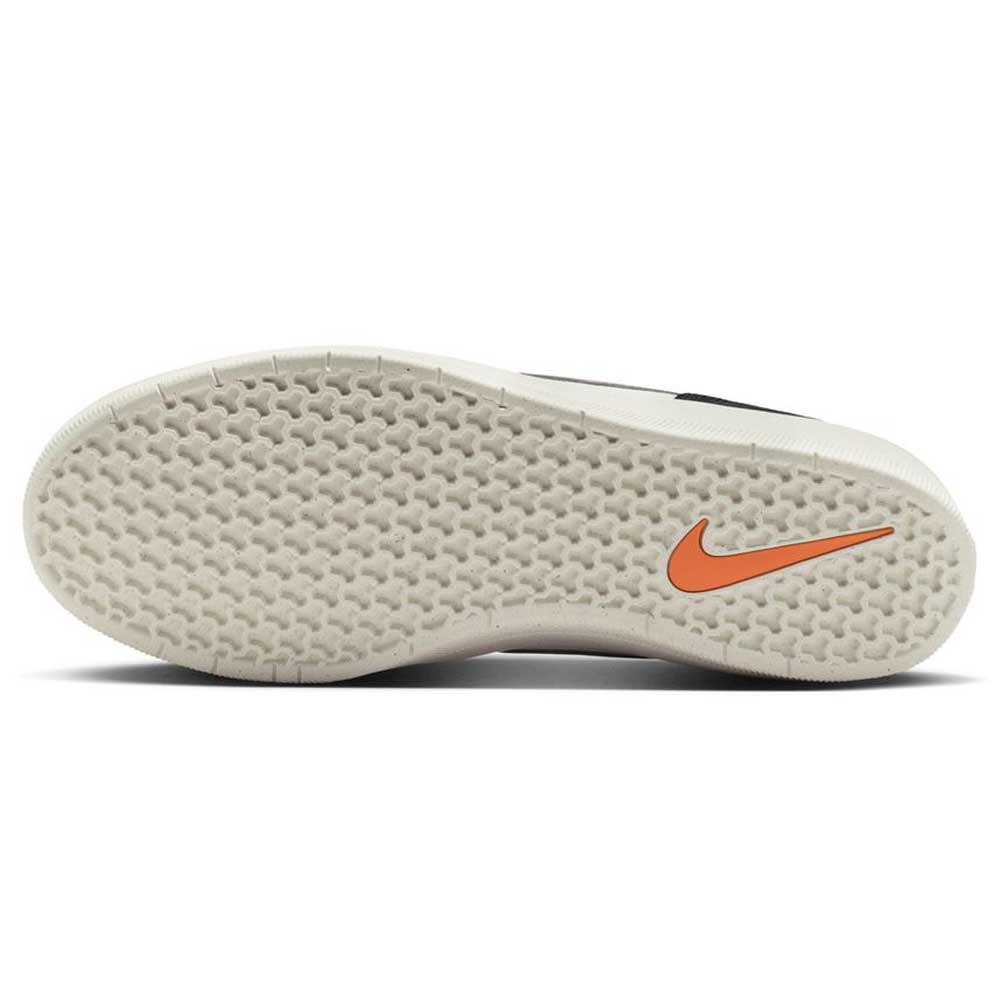 The image shows the sole of the Black White DV5477-012 Force 58 Nike SB Suede Skateboarding Shoe, featuring a textured white tread and orange Swoosh near the heel, inspired by heritage basketball and classic cupsole skate shoe styles.