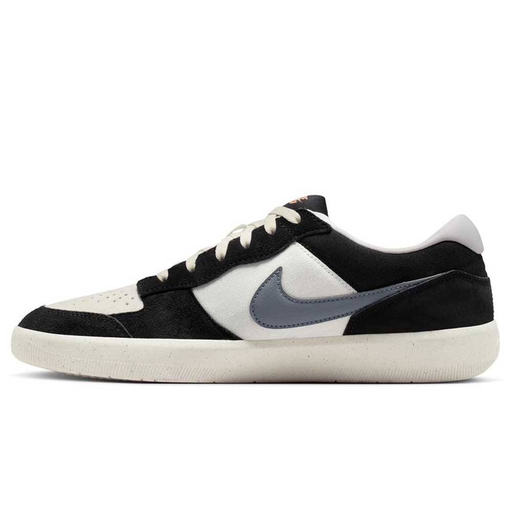 The Black White DV5477012 Force 58 Nike SB Suede Skateboarding Shoes feature a black and white design with a grey swoosh, white laces, off-white sole, and are inspired by heritage basketball cupsole skate shoes. Shown in side profile on white background.