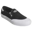 The Black White Shmoofoil Slip RX HQ4720 Adidas Skateboarding Suede Shoes feature a black slip-on design with a white sole and logo, low-cut silhouette, and minimal detailing for a sleek, modern look.