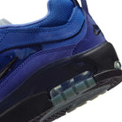 Close-up of a Blue Void Metallic Silver IR1887400 Air MAX Ishod Nike SB Skateboarding Shoe, showing the heel, part of the sole with visible Max Air cushioning, and a black Nike logo stitched on the back.