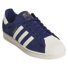 Introducing the Blue White KJ5113 Superstar Adidas Skateboarding Suede Shoes: this stylish sneaker features a blue suede upper with classic white stripes, a white heel tab, durable white rubber shell toe, and gold “Superstar” text on the side. The blue laces and tongue complete the iconic look, making these Adidas skate shoes both fashionable and built for performance.