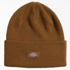 The Brown Duck Tall Cuff Beanie WHC200 by Dickies Skateboarding features a folded brim and classic front-center rectangular woven logo label.