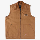 The Brown Duck Vest Thrasher Magazine x Dickies Skateboarding A88IT 0BD is a brown, relaxed-fit sleeveless vest with front zipper, two large front pockets, and small Dickies x Thrasher logos on the chest and lower pocket. Laid flat on white background.