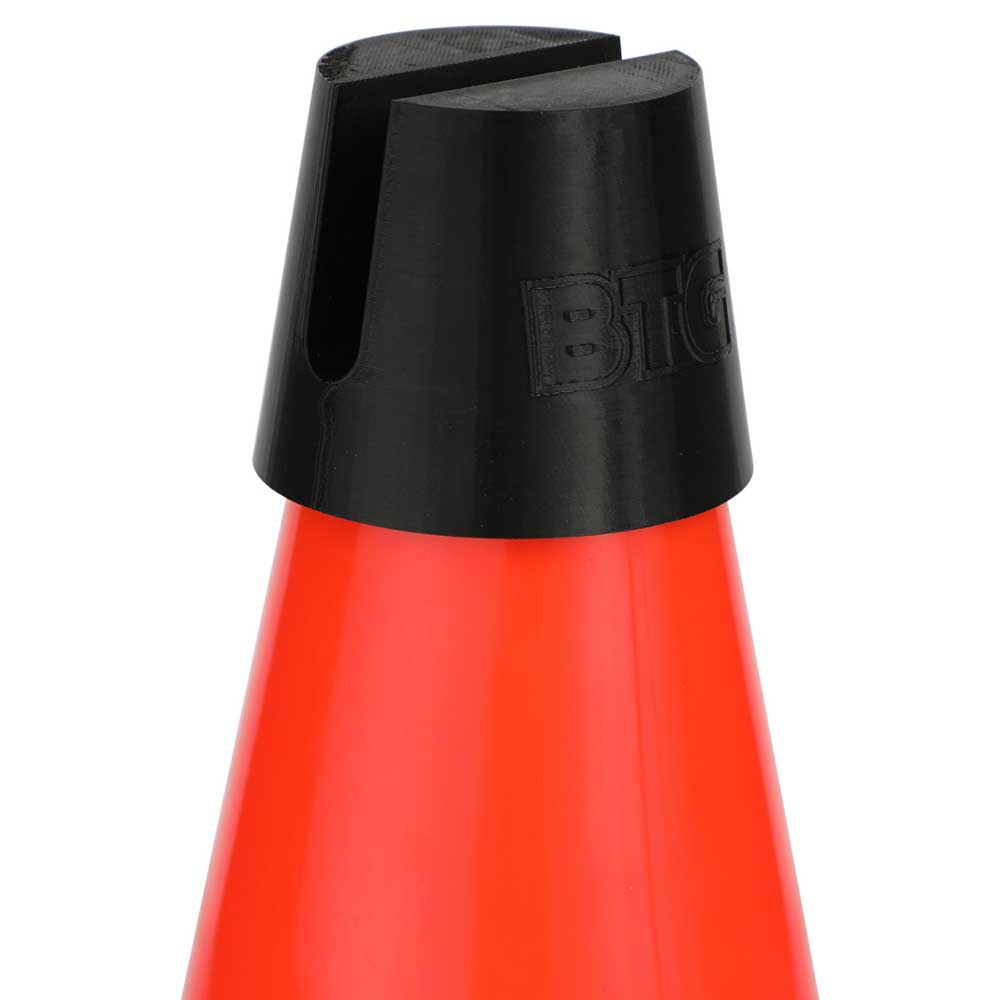 A close-up of the Built to Grind Independent Phone Cone, featuring a red plastic body and a black slotted cap on top, viewed against a white background.