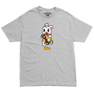 Bunny Tee Heather Baker Skateboards features a gray heather tee with a cartoon white rabbit riding a red tricycle printed on the front, and the word “baker” in yellow text below the illustration, as a tribute to Baker Skateboards.