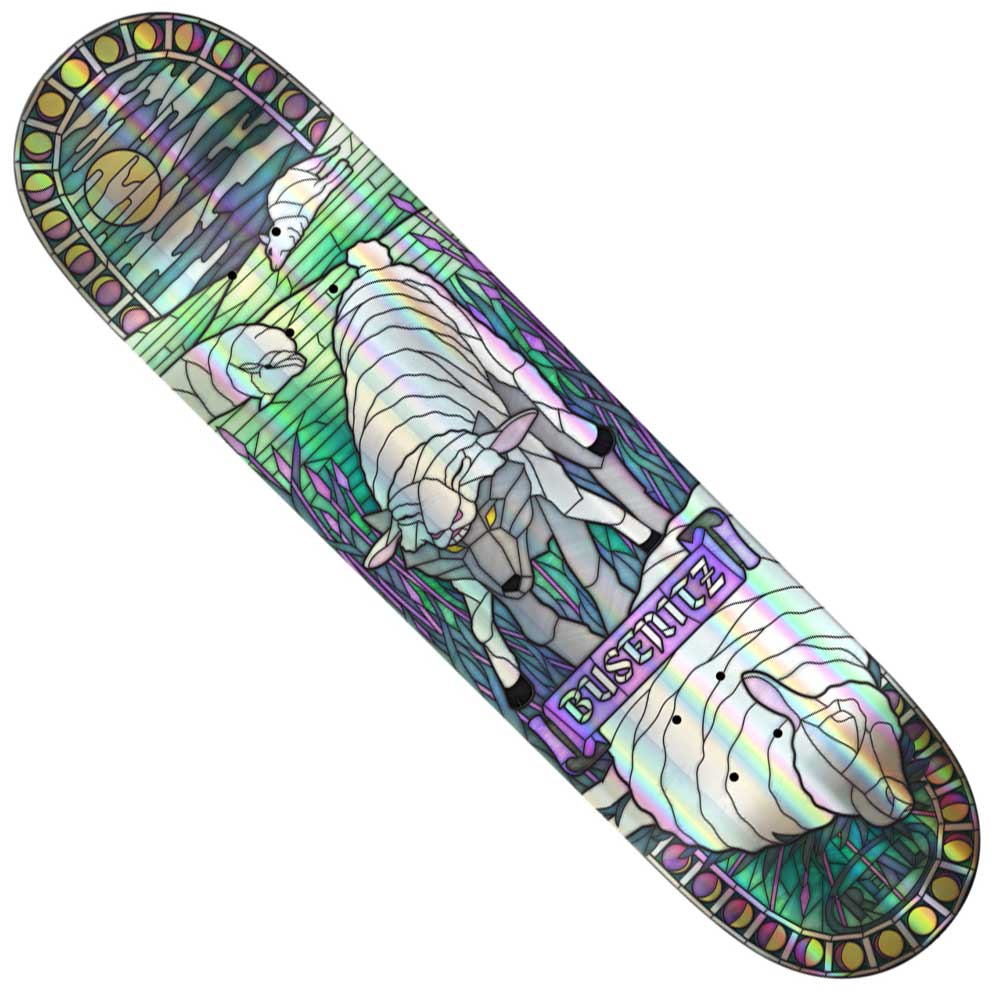 The Busenitz Holo Cathedral 8.38 Deck from Real Skateboards features a stunning stained glass-inspired illustration reminiscent of a cathedral, with sheep grazing serenely in a field and an ornate decorative border. Boldly displaying "BUSTINIZE," this deck artfully combines eye-catching design with Busenitz signature style.