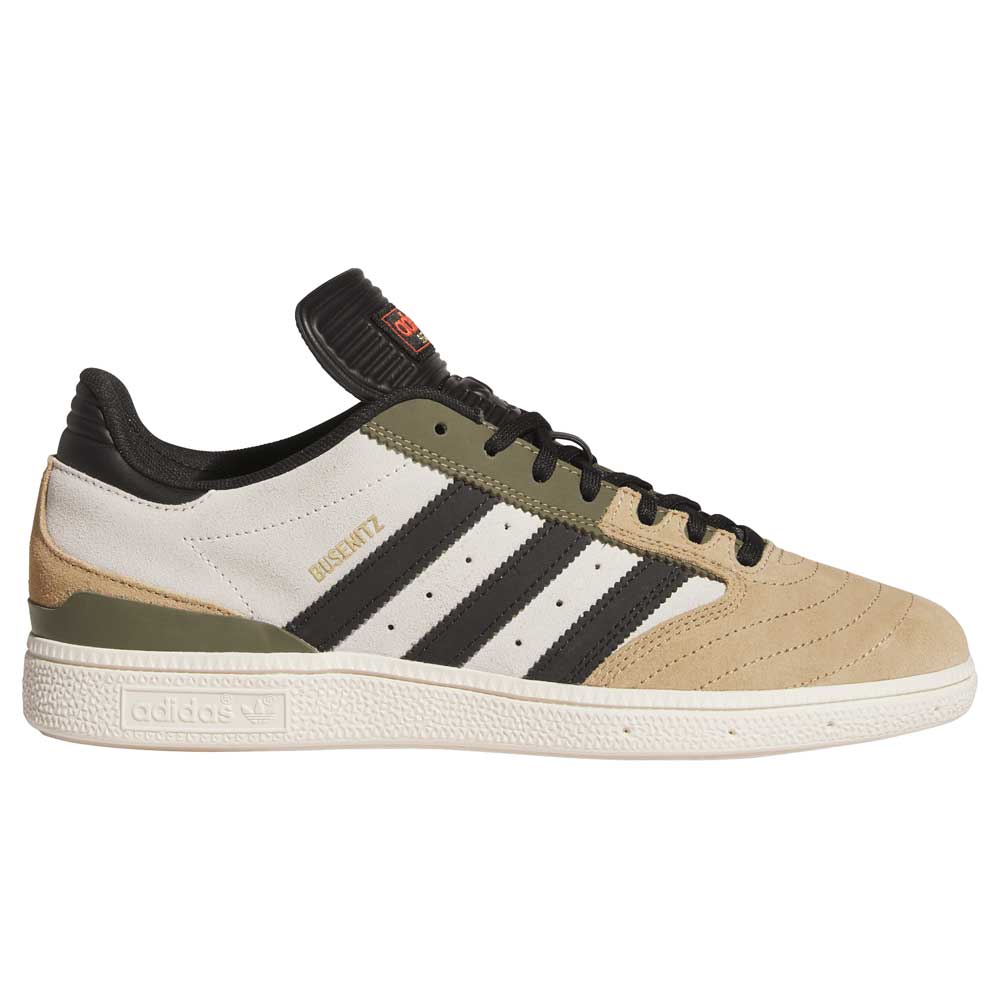 The Busenitz Tan White Black HQ4746 Adidas Skateboarding Suede Shoes feature beige, white, and olive suede with black stripes, laces, and tongue, plus "Busenitz" in gold above the stripes for a premium touch.