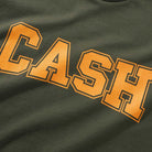 A close-up of the Campus Tee Army Cash Only T-Shirt COD150702, showing dark green cotton heavyweight fabric with "CASH" in large, bold yellow letters outlined in orange.