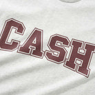 A close-up of the Campus Tee Ash Cash Only T-Shirt (COD150701), a light gray heavyweight cotton tee featuring "CASH" in large, bold, dark red letters outlined in white.