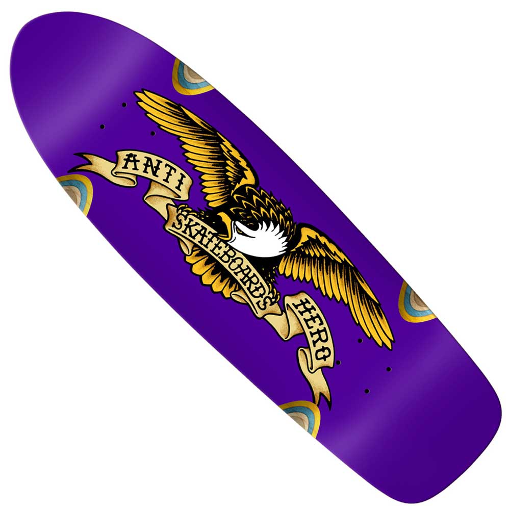Introducing the Caster Eagle Shaped 10.12 Anti Hero Skateboards Deck—a unique purple deck from Anti Hero Skateboards that showcases a dynamic flying eagle clutching a banner with the words "ANTI SKATEBOARDS HERO." This bold design features eye-catching yellow and brown accents, along with decorative details along the edges that enhance its distinct and stylish appearance.