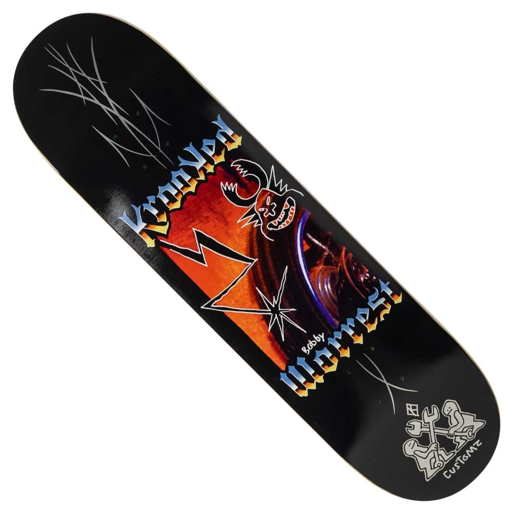 The Charm Slick Worrest 8.3 Twin Tail Krooked Skateboard Deck is black with bold “Krooked” and “Worrest” lettering, colorful sharp-edged graphics including a lightning bolt, red skull, and a small white accent at the tail.