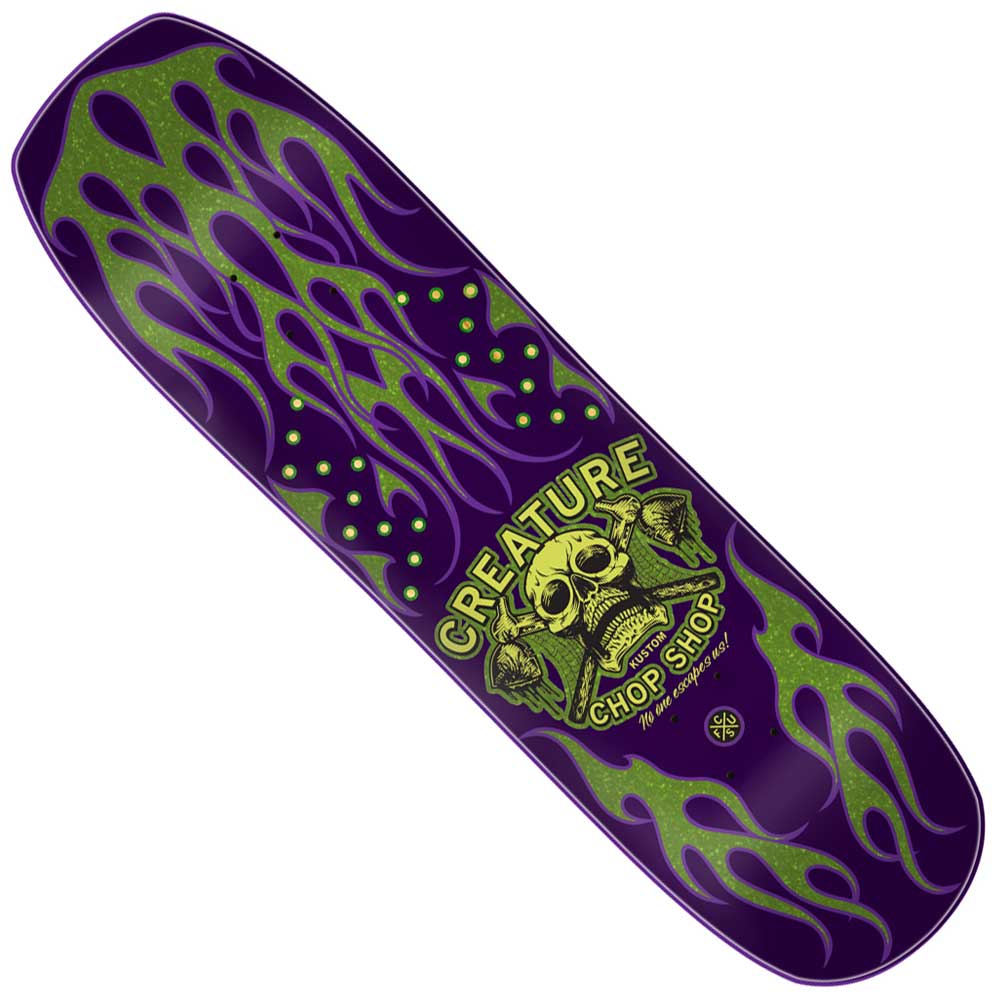The Chop Shop Flame 8.50in x 32.05in Creature Skateboard Shaped Deck features green flames on purple, a skull and bones graphic, bold CREATURE and CHOP SHOP text, and is crafted from durable 7 ply North American maple.