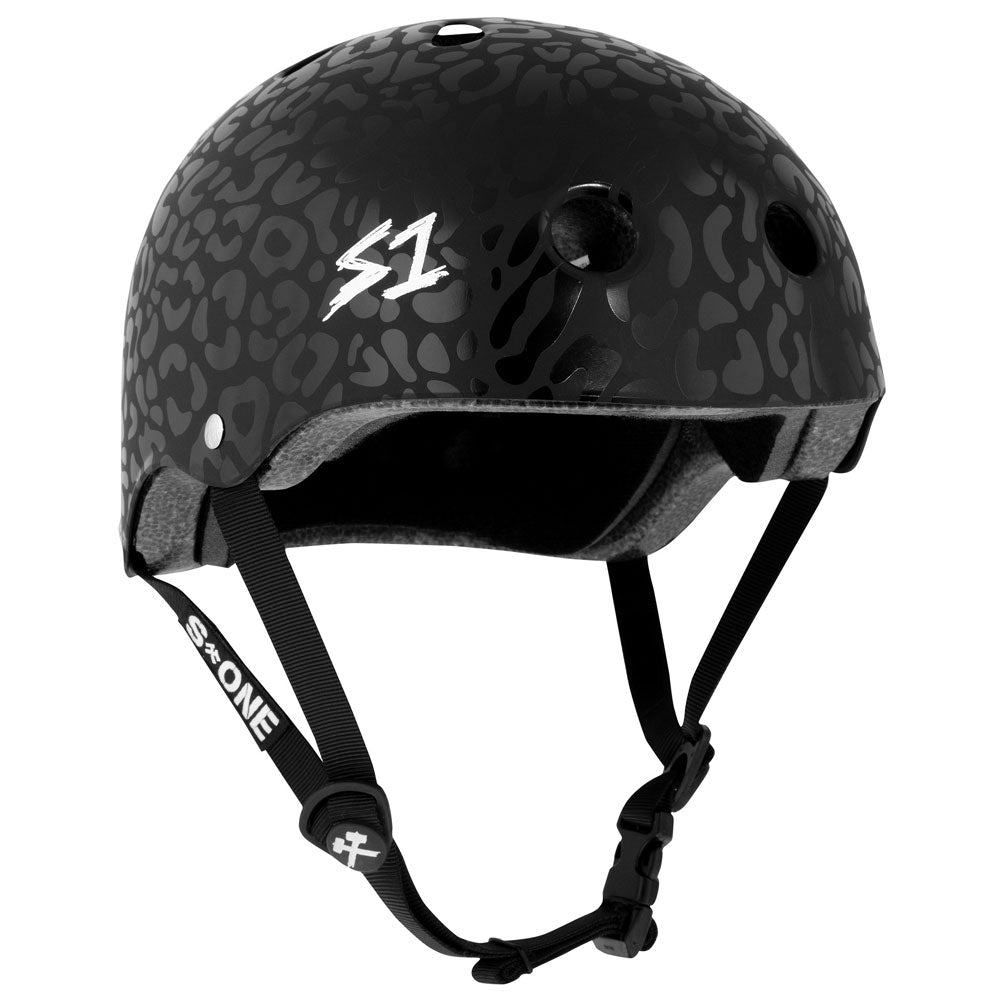 The Christian Hosoi Black Leopard Matte Lifer S1 Helmet S ONE CPSC features a subtle leopard print, ventilation holes, adjustable black straps, and a white S1 logo—perfect for skateboarding and inspired by Christian Hosoi’s iconic style.