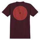 The Classic Burgundy Red Tee Spitfire Wheels showcases a maroon Skateboard T-shirt with a red and white spiral illusion graphic on the back, highlighted by "The End" in small text at the center of the spiral—offering classic Spitfire Wheels style in an iconic design.