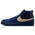 The Coastal Blue Pale Yellow IO0667400 Blazer Mid Nike SB Suede Skateboarding Shoes feature a blue high-top design, beige swoosh, matching laces, blue textured sole, responsive cushioning, and beige heel branding—ideal for skate enthusiasts.