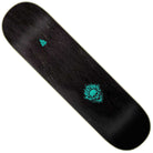 The Comicbook Relic Stumps 7 Ply Birch Creature Skateboard Deck, 8.25in x 31.80in, is black with a small turquoise tree graphic near the nose and a turquoise skull with the Creature logo near the tail.