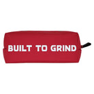 The Curb Storage Case Red OS by Independent is a rectangular red case with a black zipper and “BUILT TO GRIND” in bold white letters—ideal for organizing skateboard accessories.