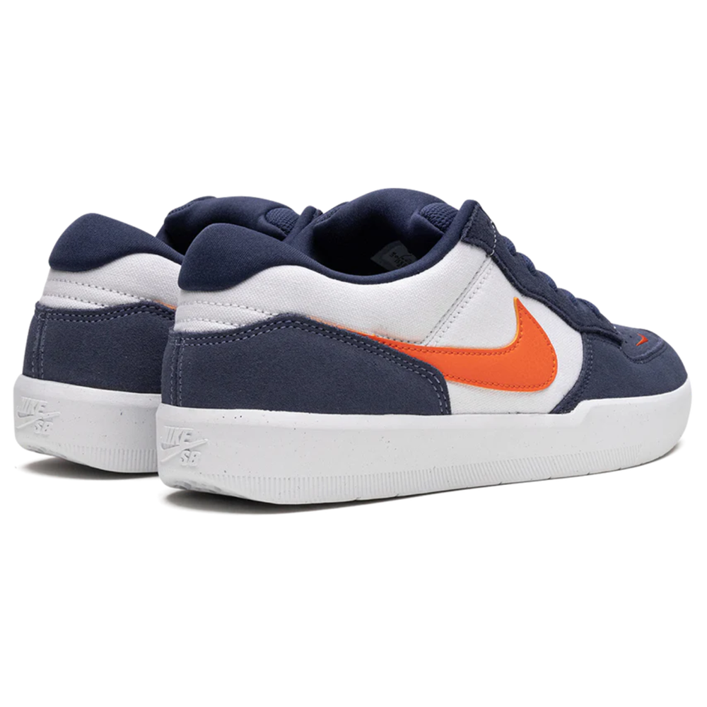 The Nike SB Force 58 Suede Shoes (DV5477-400) in Midnight Navy and Safety Orange feature a durable cupsole, white rubber soles, and dark blue laces. Shown from back and side, these sneakers combine style with comfort.