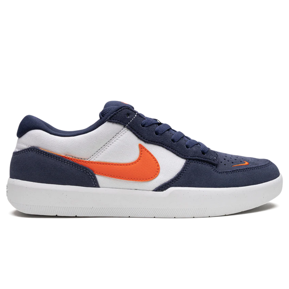 The DV5477400 Midnight Navy Safety Orange Force 58 Nike SB Suede Shoe features navy and white suede, an orange Swoosh, white cupsole, and navy laces, shown in a side view against a white background.