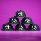 Six The Merc Green Silver 35th Houston Astros New Era Hat 5950 Fitted caps with white star logos are arranged in a pyramid against a vibrant purple background.