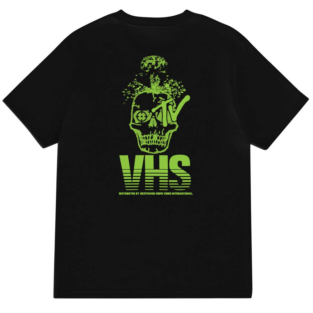 Introducing the Death TV VHS Pocket Tee Black by Deathwish Skateboards—a bold black t-shirt featuring a neon green skull graphic, an MTV logo, and text on the back that reads “VHS” and “DISTRIBUTED BY EASTERN/MTV HOME VIDEO INTERNATIONAL.” Inspired by classic Deathwish style, this pocket tee channels serious Death TV VHS vibes.