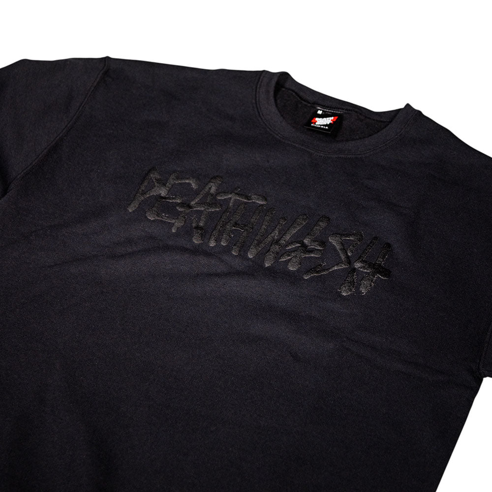 Black Deathspray crewneck by Deathwish Skateboards, featuring glossy, stylized “FEAR IT WASH” text in a graffiti-inspired font across the chest, echoing the bold street style signature to Deathwish designs. Displayed laid flat on a white background.