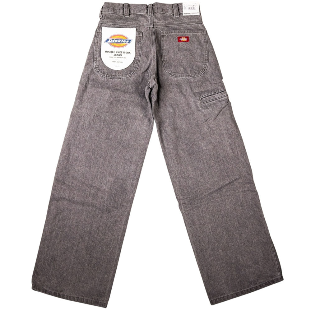 A pair of Loose Straight Grey Wash Tinted L22 A88H4 Double Knee Jean Denim Pants from Dickies Skateboarding, shown from the back with original tags, featuring wide legs and a side utility pocket.