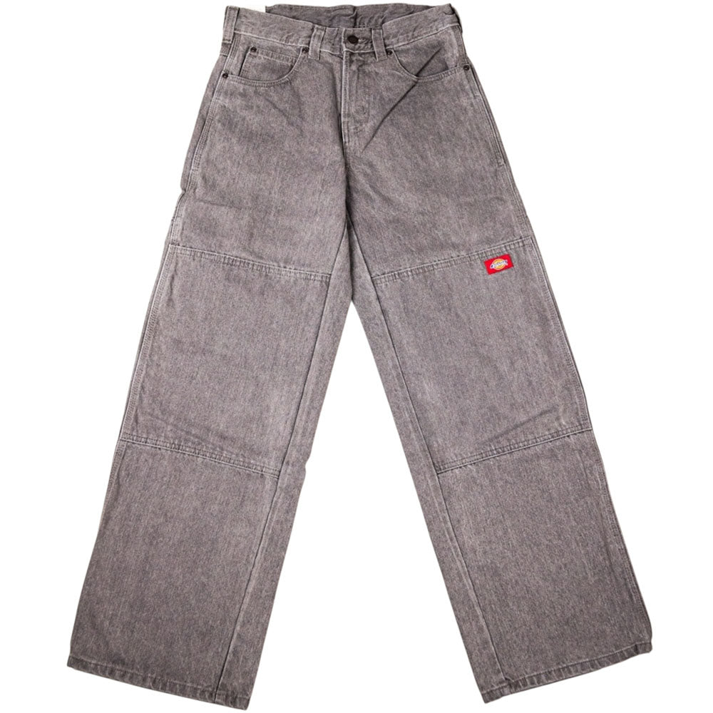 The Loose Straight Grey Wash Tinted L22 A88H4 Double Knee Jean Denim Pant by Dickies Skateboarding features reinforced knees, a red logo patch on the right leg, belt loops, front pockets, and a relaxed straight-leg fit.