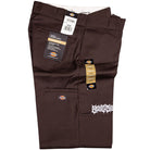 A pair of folded Dark Brown Southside Texas Icon Dickies Loose Fit Double Knee Pant 85283DB with tags, featuring a white embroidery graphic near one pocket and labeled for loose fit and straight leg.