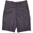 The Dickies Skateboarding Flex Shorts Modern Fit A58ZG0CH in charcoal are men's work shorts featuring a button and zipper closure, side pockets, and belt loops, shown laid flat on a white background.
