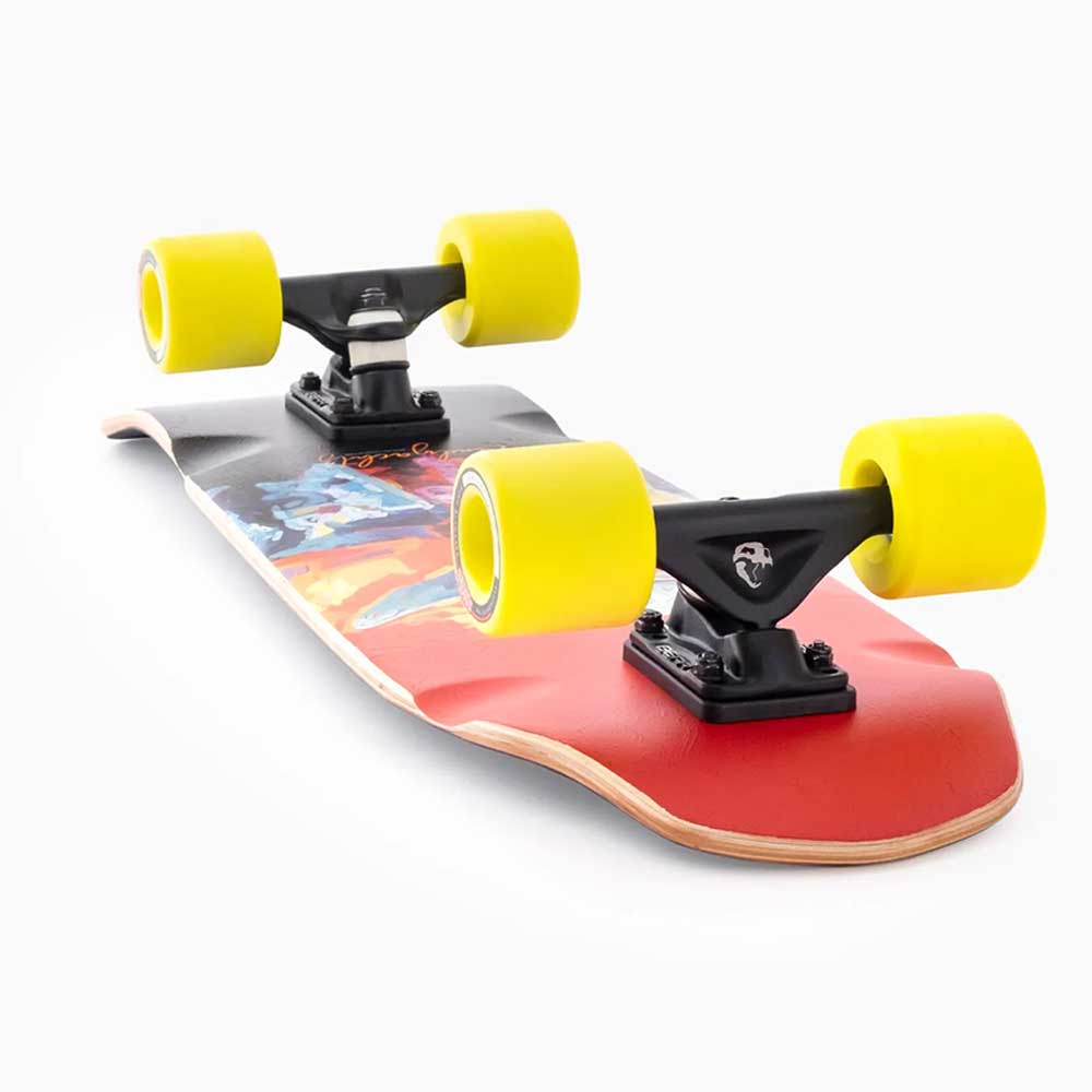 A Dinghy Legend Classic Landyachtz Complete Skateboard with a vibrant deck design, molded wheel flares, black trucks, and bright yellow wheels is shown from a low angle on a white background.