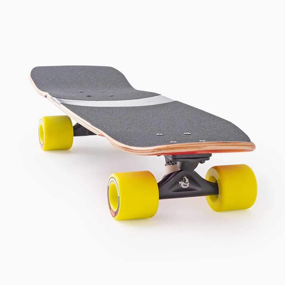 A close-up of the Dinghy Legend Classic Landyachtz Complete Skateboard shows molded wheel flares, black grip tape with a silver stripe, and bright yellow wheels, set against a plain white background.